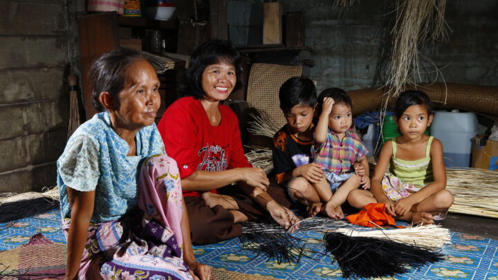 ibu nela (in red) is the head of the braiding group in mandomai;